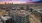 Aerial twilight of apartments  with downtown Denver views